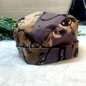 Rivers West reversible camo/hunter orange skull tupe hat. New. 21 “ diameter.